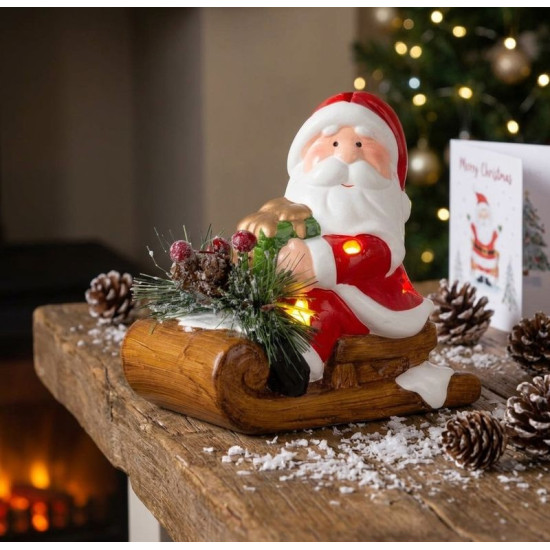 MagicHome Christmas decoration, Santa on a sleigh, LED, terracotta, 12.6x8.5x11.5 cm